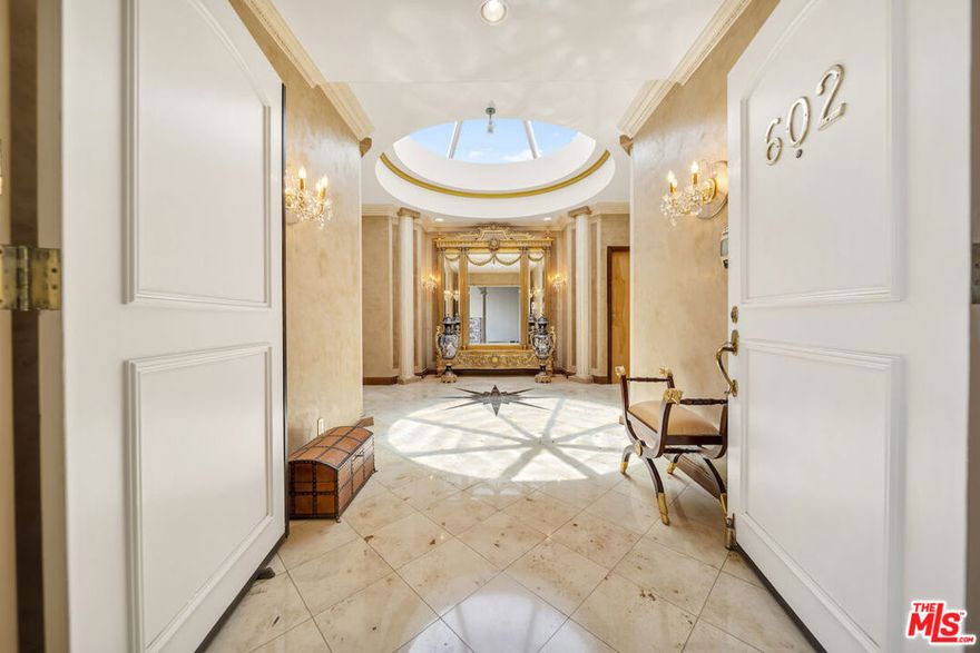 This regal penthouse in the iconic Le Faubourg building, which has been home to celebrities, offers over 5,300 sq ft of impressive unobstructed panoramic views from Beverly Hills to Downtown LA. This penthouse offers privacy and high security. 6 bedrooms, 7.5 baths, 4 fireplaces, a large chef's kitchen, formal living room with wet bar, formal dining room, library, separate service entrance and 3 dramatic pyramid skylights, flood the penthouse with natural light. The oversized primary suite includes two fireplaces, a sitting area, large walk in cedar closets and an opulent marble bath. French doors lead to multiple balconies, while a spiral staircase leads to the private rooftop, spanning over 700 sq ft, overlooking Beverly Hills and beyond. Full-service luxury begins when you pull into the driveway and are greeted by an onsite valet. Additional amenities include a large private storage room, 24-hour doormen, concierge, security, pool/spa and gym. Moments from Rodeo Drive, Sunset Blvd, and everything Beverly Hills has to offer. A rare opportunity to own this landmark Beverly Hills Penthouse in the world- famous 90210.