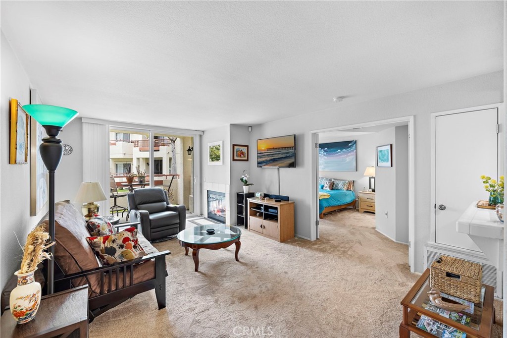 Upgraded Ground-Floor Corner Unit with Park-Like Views in Avalon at Eagle’s Crossing!
Welcome to this beautifully upgraded 2-bedroom, 2-bathroom ground-floor corner unit, perfectly situated in a light and bright prime location with serene greenbelt and park-like views. This must-see home offers a spacious and open floor plan, ideal for both relaxing and entertaining.
The large primary bedroom features two mirrored wardrobe closets, a dual-sink vanity, a walk-in shower, and a private outdoor patio—your own peaceful retreat. The second bedroom is equally spacious, and both bathrooms have been tastefully remodeled with newer countertops, toilets, and shower doors. The guest bathroom includes a tub/shower combo.
The inviting living area flows seamlessly into the dining space and kitchen, and opens to a private patio—perfect for morning coffee or evening gatherings. Enjoy central A/C, ceiling fan in the dining area, and a fully equipped kitchen with stainless steel appliances.
Stylish flooring includes plush carpet in the living room and bedrooms, and custom tile throughout the kitchen, bathrooms, and hallways. Additional upgrades include newer vinyl windows and sliding patio doors, and a gas-ready fireplace for cozy nights in. A full-size washer and dryer are conveniently located in-unit.
This home also includes a one-car garage with an insulated vinyl door, automatic opener with keyless entry, finished drywall, and built-in overhead storage, plus an additional assigned parking space.
Avalon at Eagle’s Crossing offers resort-style amenities: clubhouse, olympic pool & spa, fitness center, tennis courts, and a tot lot. The pet-friendly community is just 1.5 miles from the beach and close to shopping, dining, and more. HOA covers water, sewer, trash, and all common area maintenance.
Don’t miss this rare opportunity - schedule your showing today!