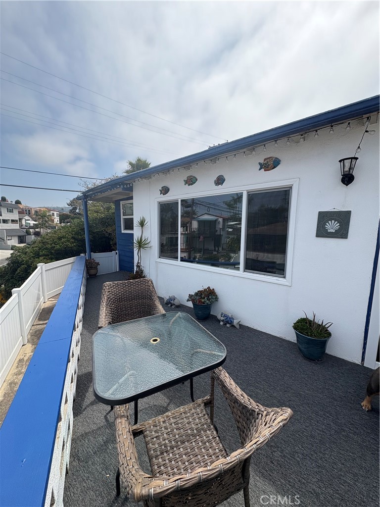 Welcome to your ideal and PRIVATE coastal retreat in North Beach San Clemente – a charming 2-bedroom beach cottage offering the perfect blend of vintage character and modern comfort. This beach home is a separate and detached unit behind the front unit.
Enjoy the ocean breeze and panoramic views from your own private patio, ideal for morning coffee or evening sunsets. This bright and inviting space features brand new light-colored laminate flooring, beamed ceiling accents, and ceiling fans for year-round comfort. The second bedroom offers flexibility as a home office, guest room, or creative studio, making it perfect for today’s lifestyle needs. Tucked away in an ultra-private setting, this cottage is just steps from beach access, giving you direct connection to the sand and surf while still enjoying peaceful seclusion.
North Beach is San Clemente’s Coastal Gem
From this charming area, you're just steps away from the ocean and some of the best beach access in town—perfect for surfing, sunbathing, or a peaceful evening stroll along the sand.
Conveniently located, North Beach offers quick access to: San Clemente Outlets – just a few minutes away, featuring top retail brands, restaurants, and a movie theater
Grocery stores & essentials – nearby options include Sprouts, Ralphs, and Trader Joe’s, all within a short drive
Downtown San Clemente & Del Mar Street – a charming district filled with boutiques, cafes, dining, art galleries, and nightlife
San Clemente Trolley – a free, seasonal public transportation service with multiple stops in North Beach, connecting you easily to downtown, the pier, and more without the hassle of driving. Whether you're enjoying a day at the beach, shopping at the outlets, or heading downtown for dinner and a sunset walk, North Beach offers the best of coastal living with everything just minutes from your door.