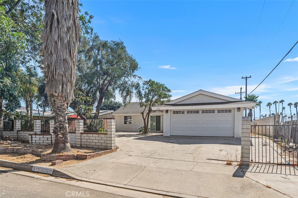 Like-new single story home in Corona's Home Garden neighborhood. This home was almost completely rebuilt and remodeled in the last year. Light, bright and open floor plan. The kitchen is open, with grey soft close cabinetry, quartz counter tops, and recessed lighting. The kitchen opens to the living area with luxury vinyl flooring throughout the living space. The primary suite is spacious with a brand new bathroom with a walk-in tiled shower. There are 3 secondary bathrooms, including a separate bedroom that is private and located at the front of the home. The attached garage is conveniently located adjacent to the kitchen door. Your chance to own a like-new home in a well established neighborhood close to the 91 freeway, shopping, markets, schools and more!