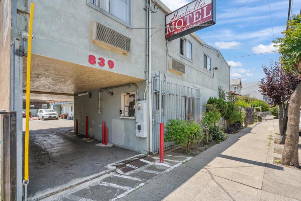 An excellent opportunity to own the Isabella Motel, a well-maintained 13-room, two-story independent motel situated in the heart of Oakland's growing commercial corridor. Built in 1965 and zoned C-30, this property sits on a 0.16-acre lot and offers 8 parking spaces. In addition to the guest accommodations, the property includes a 3-room managers unit, offering on-site living or additional flexibility for operations. This high-visibility property is strategically located near major roads and freeways, with convenient access to Downtown Oakland, Emeryville, and public transportation. With strong traffic volume and a central urban location, the Isabella Motel is ideal for owner-operators or investors seeking an income-generating hospitality asset with room for long-term growth and potential repositioning.