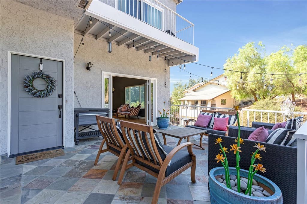 Photo of 20906 Almazan Road, Woodland Hills, CA 91364 (MLS # SB26123952)
