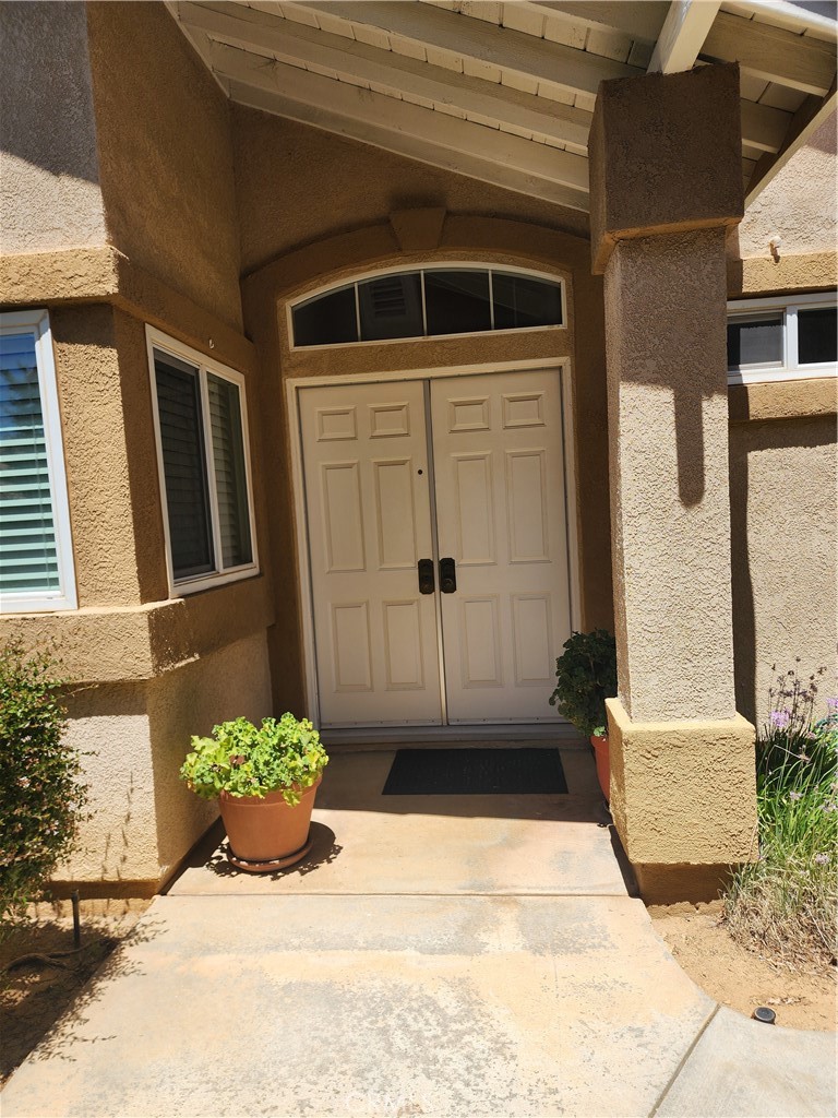 GORGEOUS, HIGHLY UPGRADED "SPYGLASS" Model CONDO Perfectly set in a Quiet Cul de Sac in Beautiful SUN LAKES COUNTRY CLUB, Southern California's Premier 55+ Active Adult Community. Located in the FAIRWAY VILLAS CONDO GROUP featuring an Open Floor Plan, Approx. 1477 SF, 2 BD + Large Loft, 3 BA, 2 Car + Golf Car Garage, LARGE Living Room w/Decorative Stack Stone Fireplace, Modern Kitchen w/Custom "Soft Close" Drawers, Granite Counter Tops & Breakfast Bar, Stunning Black Appliances, Custom French Doors w/built in shades lead to the back patio w/slated Patio Cover, Fruit Trees, Dining/Breakfast Nook, Earth Tone Upgraded Carpet & Tile, Large Loft w/full Bath w/Skylight, Large Primary Bedroom w/Walk In Closet and Bath, Separated Guest Bedroom and Bath rooms for comfortable privacy, Indoor Laundry w/Washer & Dryer Included, Newer A/C, Full Two Car Garage w/Golf Car parking area. Condo Residents enjoy a Private Pool and Spa for their use only, in addition to all other pools and Sun Lakes Amenities, FREE CABLE TV & INTERNET INCLUDED, Common Area Landscaping Service Included.The Amenities Include: Two 18 Hole Golf Courses - Championship & Executive, Driving Range, 2 On Site Golf Pro Shops, 3 Clubhouses, Grand Ballroom, 2 Restaurants, NEWLY EXPANDED & REMODELED LOUNGE, Indoor & Outdoor Pools, Bocce Ball, Tennis, Pickle Ball, All Types Of Clubs & Events - Endless Opportunities For New Friendships. AT SUN LAKES COUNTRY CLUB -EVERY DAY FEELS LIKE A VACATION!