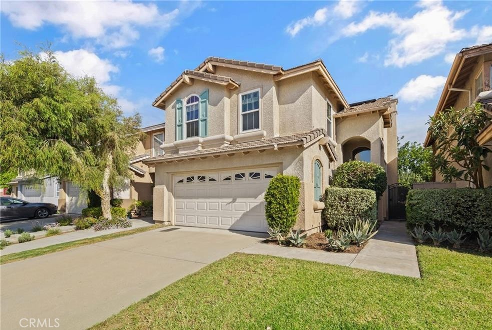 This Beautifully Maintained Home in Rancho Cucamonga. This inviting 3-bedroom, 2.5-bathroom home offers the perfect blend of comfort, style, and functionality. Situated on a quiet, tree-lined street in a highly desirable neighborhood, this two-story residence boasts excellent curb appeal and a well-designed layout ideal for everyday living and entertaining. Inside, you'll find a bright formal living room and a cozy family room. The spacious kitchen features laminate countertops, white appliances, and ample cabinetry making it the heart of the home. Upstairs, the primary suite offers a peaceful retreat with an en-suite bath and a standard wall closet. Two additional bedrooms share a full bath, and there's a convenient half bath downstairs for guests. Step outside to enjoy a backyard with lush green grass, perfect for relaxing, entertaining, or outdoor play. Additional features include a 2-car garage. Located near top-rated schools, Victoria Gardens, parks, shopping, dining, and major freeways this home delivers value, comfort, and location.