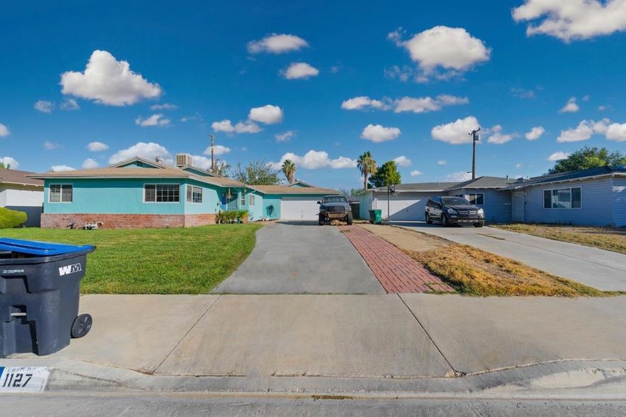 This beautiful 3-bedroom, 2-bathroom home features an attached 2-car garage and a spacious 1,305 sq. ft. floor plan. Upgraded with a new addition, the property now includes a large studio with a bonus bedroom and bathroom perfect a extended family!  Enjoy tile flooring, a bright and open kitchen, and a comfortable living room ideal for entertaining. Whether you’re looking for your next investment or a home with versatile living options, this property checks all the boxes.