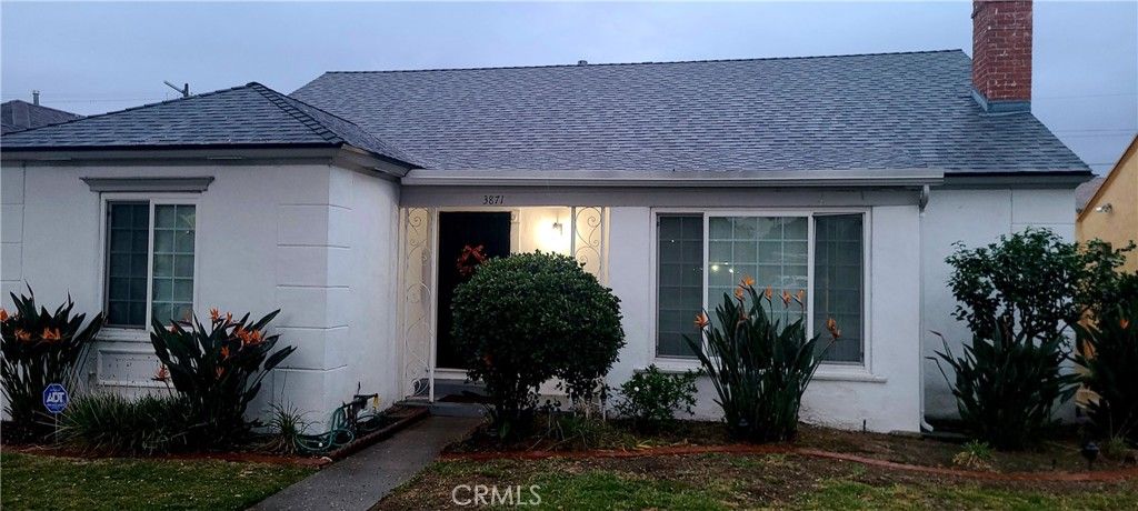 Photo of 3871 Grayburn Avenue, Los Angeles, CA 90008 (MLS # SR25190396)