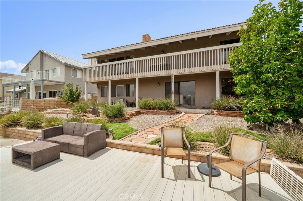Discover the perfect blend of comfort and lifestyle in this stunning lakeside home, nestled in the highly sought-after Spring Valley Lake community. This residence captures sweeping water and hillside views that set the tone for perfect everyday living.
Step inside to find soaring ceilings, an abundance of natural light, and breathtaking lake views the moment you enter. The open layout seamlessly connects the formal living room, dining area, and kitchen—designed for both casual gatherings and entertaining. This two-story home features 3 bedrooms and 3 bathrooms, with high ceilings enhancing the dining and family rooms. Upstairs, both bedrooms share access to a spacious patio overlooking the lake and surrounding hillsides. The backyard is designed for relaxation and entertaining, featuring a large patio and built-in firepit with direct access to the lake. Enjoy boating, fishing, and water sports right from your own backyard.
Living in Spring Valley Lake means access to a 200-acre private lake, Meadowlark Park, and nearby shopping, dining, and schools—all adding to the unbeatable lifestyle this community offers.