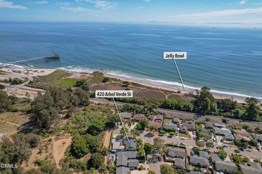 Situated on a sunny corner at the end of Arbol Verde, this special Carpinteria property has been lovingly cherished by the same family since it was built. The move-in ready main home offers 3 bedrooms and 2 bathrooms, highlighted by a wood-burning fireplace, updated kitchen and baths, upgraded flooring, baseboards, and fresh paint throughout. A detached 1-bedroom, 1-bath guest house with its own private side entry makes an excellent rental, guest retreat, or extended family space. Outdoor living is at its best with beautiful patios, mature landscaping surrounding the property, a convenient outdoor shower for beach days, and a 2-car garage. All of this in one of Carpinteria's most sought-after neighborhoods--close to favorite beaches and just minutes to downtown...all the best of Carp!
