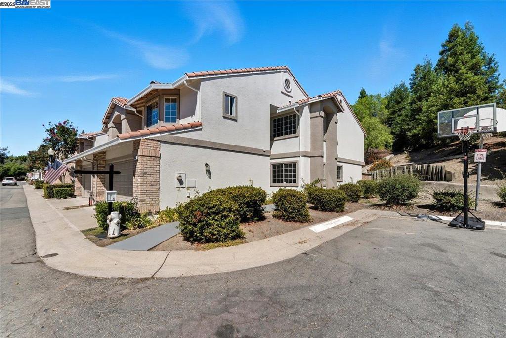 Welcome to the charming home nestled in a serene cul-de-sac with no front & rear neighbors for ultimate privacy, like an attached single family with a quiet yard surrounded by nature. *This bright corner unit home, in a premier location, offers modern living surrounded by amenities & activities for young couples & families. *Highly rated Danville schools. *Family & kid-friendly Somerset community, & Ideal for animal lovers. *This lovingly updated home boasts a functional floor plan with high ceilings living room & a cozy gas fireplace, formal/informal dining areas, an updated gourmet kitchen, granite counters, large counter space, an open railing staircase, vaulted ceiling master suite, large guest bedrooms. This well-cared home offers beautiful laminate flooring complete house, freshly painted, central heating & cooling, updated baths, light fixtures & more, laundry room. *Attached two car side-by-side garage. Spacious Primary bedroom with vaulted ceilings & walk in closet, Dual vanity. Walking distance to Blackhawk Plaza/Tassajara Crossing for strolling, shopping, Century theaters, yoga, gym, restaurants, walking trails, parks/preschools and a museum right at your door step! Easy access to 680/580 freeways, downtown Danville with all its quaint shops & wonderful dining spots.