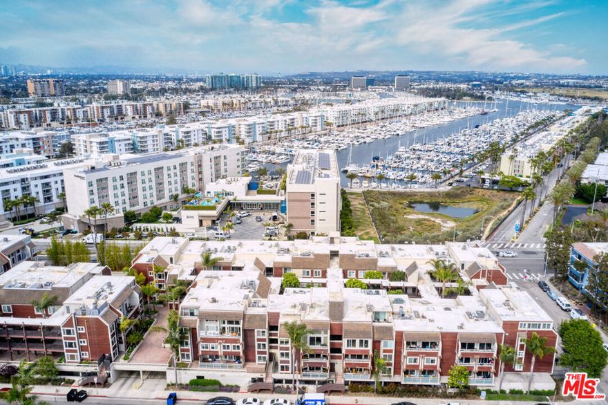 A+ Location! Extremely Rare Penthouse Offering in Marina Strand. Sunlit Coastal Living. This is a rare opportunity to own one of the few penthouse residences in the highly sought-after Marina Strand community. Beautifully upgraded and filled with natural light, this stunning home features dramatic 25+ foot ceilings, oversized windows, and a spacious, flexible layout perfect for modern coastal living. Enjoy two large bedrooms, a versatile loft, and a dedicated office space ideal for remote work or creative use. The open-concept living and dining area opens to a walkout balcony, great for morning coffee or evening BBQs. The cook's kitchen offers ample counter space and storage, while the private primary suite includes two walk-in closets. New carpet and fresh paint throughout make it truly move-in ready. Located just three blocks from the beach and one block from the Grand Canal, you're also moments from the harbor, jetty, and Marina's vibrant scene. Walk or bike to cafes, restaurants, and coastal trails, yet you're only 15 minutes from LAX. Two-car side-by-side parking + extra storage closet. This rare penthouse isn't just a home; it's your chance to live the ultimate Marina del Rey lifestyle. Move in now and enjoy summer by the beach.