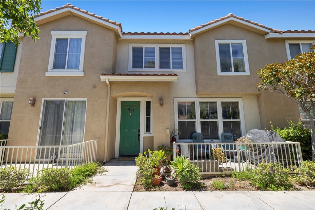 Welcome to this inviting 3 bedroom, 2.5 bath townhouse with 1,375 sq ft of comfortable living in the highly sought-after Sundance community of Santa Clarita. The entry level showcases an open floor plan with laminate flooring, a welcoming fireplace, and seamless flow into the dining and kitchen areas. The kitchen is complete with stainless steel appliances, a breakfast bar, and ample cabinetry. Upstairs, retreat to the spacious primary suite featuring mirrored closets and a private spacious bathroom. Two additional bedrooms provide versatility for family, guests, or a dedicated office. Additional highlights include a designer-inspired powder bath, natural light throughout, and a two-car garage offering secure parking and storage. Community amenities feature sparkling pools, relaxing spas, and well-kept landscaping surrounded by Mediterranean-style architecture. Ideally situated near schools, shopping, dining, and easy freeway access.