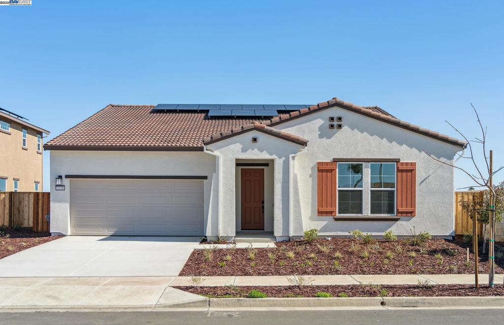 New community, Seagrass by Pulte Homes in charming Discovery Bay. Enjoy this new energy efficient construction, single story home. Washer, dryer, and refrigerator included in purchase. A serenity lake is a central feature at Seagrass. A new amenity center is under construction which will feature outdoor gathering places and games, pickle ball courts, a half basketball court, and a 2+ mile perimeter trail for additional strolling opportunities. Solar equipment with battery back-up is included in this purchase price. This quick move-in home is ready for celebrations. Lot 51, Plan 1.