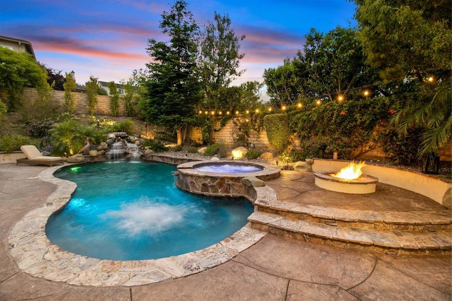 Welcome home to this single story 4 bed 3 bath home located on a quiet cul-de-sac in the highly sought after Dos Vientos neighborhood, Quintana. As you walk in, you will immediately notice the grand turret entrance, open floor plan, crown molding, hardwood floors, plantation shutters, and ample natural light. Host dinner parties in your chefs kitchen which is equipped with newer stainless-steel Viking appliances, granite counter tops, a huge granite island, custom cabinets, dual ovens, accent lighting, plenty of storage, and flows into the breakfast area. Relax in the family room in front of your cozy fireplace with a sleek tile wall. The master retreat is graced with crown molding, a deep soak tub, modern tiled shower, large walk-in closet, and direct access to the spacious yard. Entertain guests in the resort style backyard with a solar heated sparkling pool and spa, custom built-in BBQ station with palapa, solid patio cover, mounted TV, stone waterfall, fire pit, and turf throughout. Even test your skills on the four hole putting green. Additional amenities include a 3-car attached garage with direct access, 9ft ceilings, dual central a/c, and dual pane windows. This high tech home has multi internet access points, security system & recording cameras.