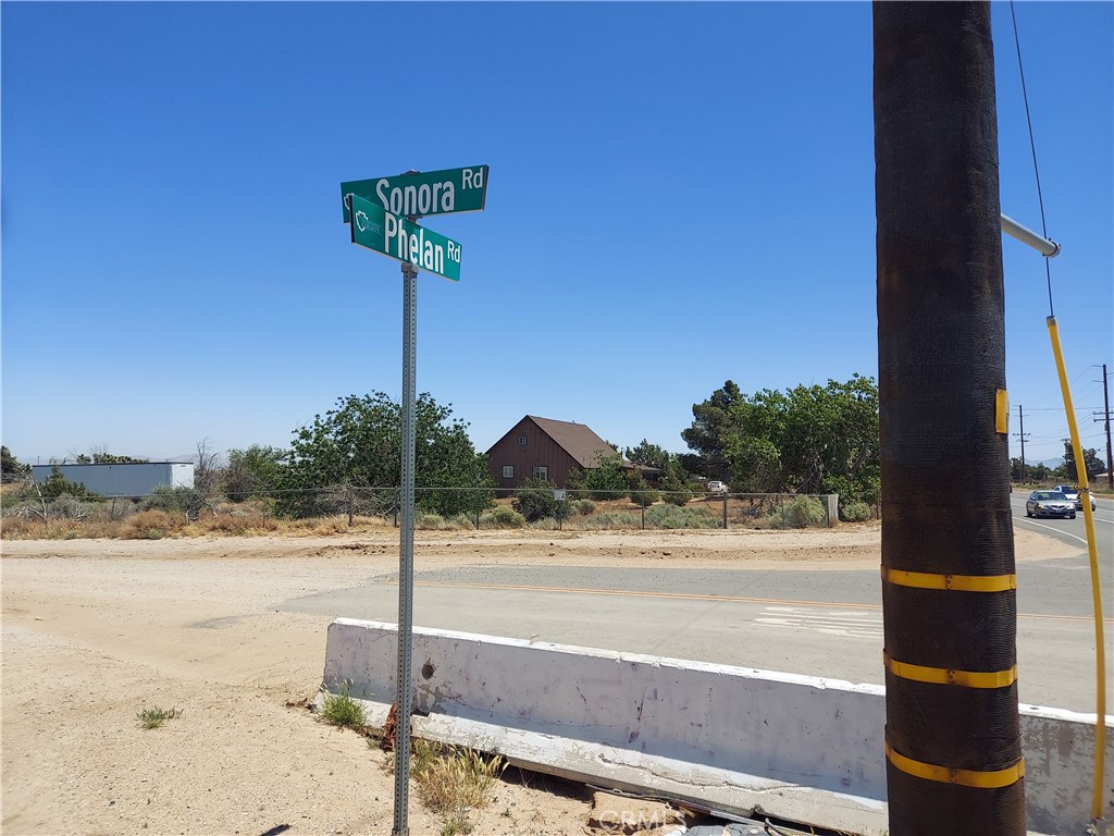 Frontage on paved Phelan Rd. 3 miles from town with shopping and services. 5.75 miles from new 194 ac Amazon logistic center on Phelan Rd west of Hwy 395. Could be subdivided into smaller parcels. Water and electric are available.
Seller may finance with substantial down payment on approved credit.
Main water lines runs along east side and south side of property. The water line on the south side is on the opposite side of the street, so probably better to access water line that runs along east side of property, which is Sonora Rd.
GPS Coordinates: 34.427465,-117.513265