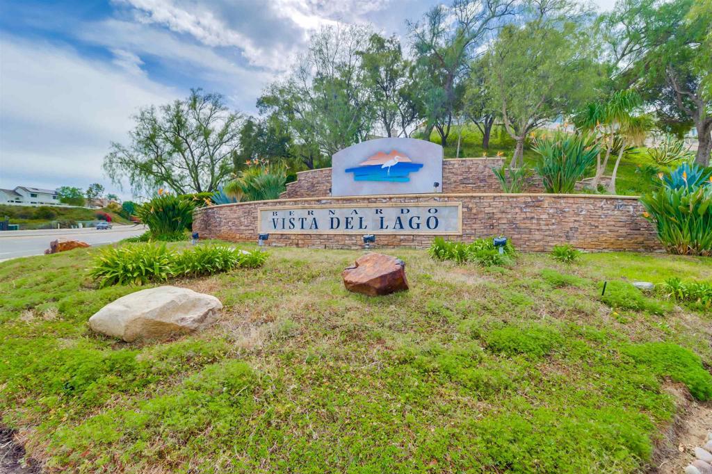 Complex now approved for Fanny Mae and conventional lending. Sellers will agree to pay first 6 months of HOA dues with accepted offer. Come check out the Bernardo Vista Del Lago resort lifestyle complete with 2 community hot tubs, 3 pools (including 25-meter exercise lap pool), fully equipped exercise gym, pickleball, tennis, recreation room, duck pond and scenic hiking and biking trails. When you're done enjoying all of the community amenities, come home to a gorgeous, turn-key condo, lovingly updated over the past 2 years by caring owners. This must-see top to bottom remodel includes new lighting, paint, fireplace, kitchen, bathroom and flooring. Step through the freshly painted front door and designer entry tile to find a bright and luxurious, vaulted ceiling living room complete with modern LED lighting and a fireplace finished with modern concrete surround over tile, capped by a thick wooden hearth. The kitchen has been redesigned with bar height counter to improve its connection to the dining space and boasts modern gray, shaker style cabinet doors with brushed nickel handles, light colored stone countertops, all new appliances (included), deep single compartment sink, new faucet, tile backsplash, LVP flooring and modern light fixtures. Past the kitchen bar, a large wall mirror (included with sale) adorns the dining space. Custom-built, white barn door separates the bathroom, bedroom and in-unit laundry (stacked washer/dryer included with sale). Primary bedroom includes a walk-in closet, updated LED lighting and sliding glass door to patio. The patio offers room for a BBQ and cafe table with a view to Battle Mountain and its cross. Bathroom has been completely redesigned with farm style double sink vanity, beautiful sea foam tiled shower surrounded by glass and a frameless sliding bypass door, new lighting, mirrors, faucets, multi-color Bluetooth speaker/fan/light, toilet and LVP flooring. List of recent upgrades: Fresh paint throughout; New light fixtures and chandeliers throughout (LED can lights w/dimmers were also added); added power outlets w/USB ports; LVP flooring in kitchen and bath; Kitchen: Granite countertop, tile backsplash, deep single bowl sink, disposal, faucet, refinished cabinets w/new hardware; Bathroom: Expanded shower replacing wall with gorgeous glass and sliding door, modern farmhouse style double sink vanity, mirrors, light fixtures, toilet, multi-color fan/light connects to bluetooth for music in the shower; built-in laundry shelving.