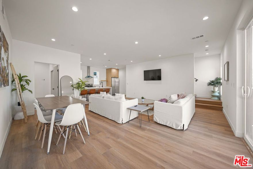 5 BED / 5 BATH | PRIVATE ROOFTOP DECK | PRIVATE 2-CAR ATTACHED GARAGE | IN-UNIT WASHER/DRYER | CENTRAL A/C | PET FRIENDLY | SPACIOUS BEDROOMS | GENEROUS LIVING AREAS! Contemporary luxury in this newly built townhome, thoughtfully crafted for comfort and elegance. With soaring ceilings, abundant large windows, and flowing open floor plans, each home is bright and welcoming, filled with plenty of sunlight.Highlights include high-end touches throughout, such as a chef-inspired kitchen equipped with a generous island, modern cabinetry, durable quartz surfaces, and top-quality stainless steel appliances ideal for everyday meals or hosting guests. The oversized bedrooms offer plenty of room to unwind, and the luxurious bathrooms feature upscale fittings, double sinks, and beautiful tiling. Extend your living space outdoors with a personal rooftop terrace that includes a convenient mini fridge, great for relaxing or entertaining while enjoying urban vistas. Convenient features like a direct-access two-car garage for secure parking and additional storage, plus full-size laundry appliances right in your unit. Nestled in a gated community for added security and tranquility, this excellent Van Nuys spot keeps you near shops, restaurants, attractions, and easy freeway access. These welcoming homes are pet-approved, so your companions are part of the family! Come see the perfect mix of style and practicality - book a viewing soon! *4 WEEK FREE PROMO - PRICE REFLECTS 12M SPREAD - BASE $5,795*