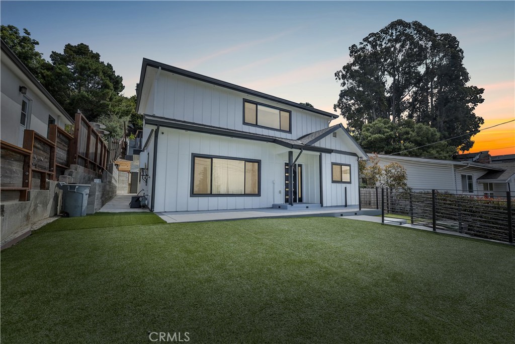 Stylish and updated with incredible Bay views, this 4-Bed, 3-Bath Home in the Oakland Hills blends modern finishes with flexible living space. The open layout connects the kitchen, dining, and living areas, making it great for everyday living and entertaining. The kitchen features quartz countertops, stainless steel appliances, and clean, contemporary design. The primary suite is a comfortable retreat with its own bathroom and views. A separate studio with private entry includes a full kitchen, bathroom, mini split system, and durable flooring, perfect for guests, extended family, or workspace. Outside, a large deck takes full advantage of sweeping views of the Bay and City. The yard includes synthetic turf, new fencing, fresh landscaping, and an updated driveway. Major upgrades include a new roof, HVAC system, electrical panel, energy-efficient windows, driveway, new deck, retaining wall, doors, smart home features, and a security system. Move-in ready and made to enjoy.
