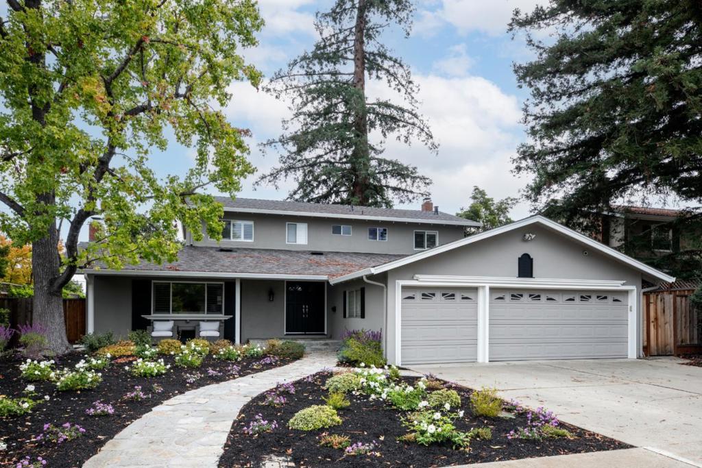 Classic traditional appeal and extensive just-completed remodeling define this beautiful home in sought-after Waverly Park. The two-level design with 4 bedrooms and 3 baths is perfectly refreshed with new paint inside and out, brand new hardwood floors on the main level and staircase, new carpet upstairs, plus an all-new kitchen and primary suite bath. Formal living and dining rooms at the front of the home give way to the stunning all-white kitchen with spacious casual dining room at one end and inviting family room at the other, each opening to the rear yard. Upstairs, the primary suite has a newly remodeled bath, and three additional bedrooms are served by an updated bath. Outdoor enjoyment awaits with an arbor-covered patio, eco-friendly synthetic lawn, and a signature redwood tree. A premier neighborhood location close to top-rated Mountain View schools and El Camino Hospital completes this outstanding home.