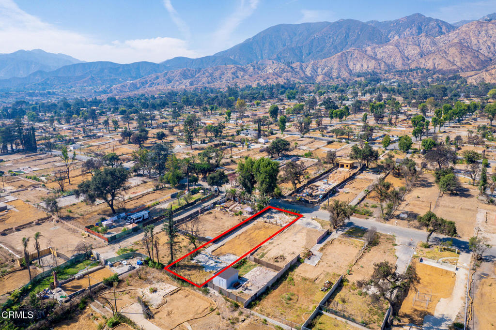 This spacious 9,339 square foot lot is nestled in the heart of Altadena, offering an opportunity to build your dream home in a serene residential neighborhood. The original home was lost in the Eaton Fire, leaving a clean slate for new construction. Ideally located near scenic hiking trails, beautiful parks, and the Jet Propulsion Laboratory (JPL), the property is also just minutes from The Rose Bowl and vibrant Old Town Pasadena. Enjoy the perfect blend of tranquility and convenience in one of Altadena's most desirable areas.