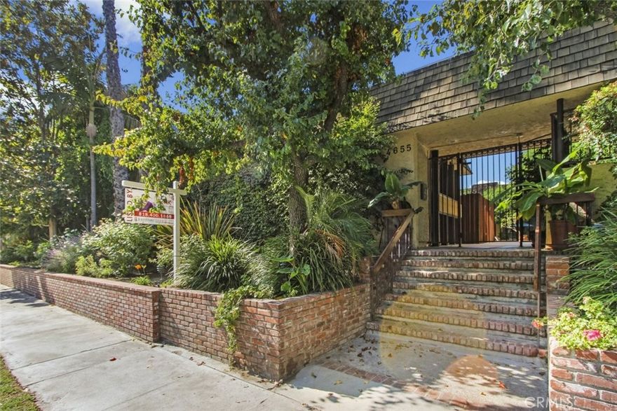Stunning split-level Town house for Lease with 2 bedrooms and 2.5 bathrooms located in the heart of Sherman Oaks. Upon entering the unit, you are greeted with a fabulous floor-plan with laminate flooring, baseboard moldings, high ceilings with crown moldings and recessed lighting throughout. The step-down living room features a dry bar, large mirrored backdrop with a fireplace, as well as access to your private patio, ideal for outdoor seating. In the kitchen you will find mosaic tile back-splash, wooden cabinetry with metal handle detailing, stainless steel appliances and granite counter-tops with bar stool seating! All two bedrooms are bright and spacious. The Master bedroom is an en-suite with a large walk-in closet and a private bathroom with a granite counter top.  Wonderful community amenities include a resort style like pool and spa with outdoor seating and an abundance of mature trees, great for extra shade during warmer days. Ideal for someone that can walk to Ventura Blvd and all the restaurants and shops!
