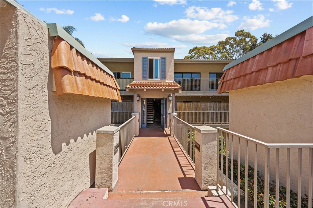 Welcome to 2360 Hosp Way #229 in CARLSBAD, your coastal dream! Located in The Grove, a quiet and well maintained community, and just a hop, skip, and a jump to Carlsbad's sun-kissed beaches and bustling downtown, this newly remodeled TWO bedroom condo is the perfect beach pad! Enjoy the ultimate in convenience with nearby shopping, dining, and endless entertainment. Ground floor living means no stairs to climb, and the primo parking spot right by the building sweetens the deal. Inside, you'll find modern finishes, a totally remodeled open kitchen, ceiling fans and brand new lighting in every room. Dive into relaxation with the community POOL and SPA, explore the eucalyptus forest walking trails and let your dog enjoy too! From top to bottom, this condo is a total knockout with brand new flooring throughout, plenty of storage with LARGE mirrored wardrobe doors, a completely remodeled and updated kitchen with shaker cabinets, quartz countertops, and equipped with modern stainless steel appliances, plus CONVENIENT in-unit laundry! Not to be missed, the bathroom has JUST been totally re-done and is spa-worthy and truly must be seen, Don't forget, the 2nd oversized bedroom features a walk-in closet, and there's an exterior storage space as well! The Hoa also covers water AND trash! This coastal gem features open-concept living, perfect for entertaining with HUGE sliding doors that flood the space with natural light, and opens up and invites you outside to a private and perfect patio to sip and enjoy! Ideal for first-time buyers, those seeking a vacation getaway, or a savvy investor looking for prime coastal real estate, this adorable community is not only gated, you've got 2 dedicated parking spots, is adjacent to the freeway for seamless and easy access to anywhere you're going, and just TWO very short miles to the beach! Hurry and schedule your private showing, before it's gone and seize the coastal lifestyle today!