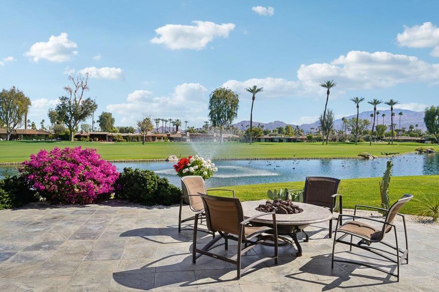 Rarely on the market, this A+ location has exclusive lakefront living at this remarkable residence set within The Springs Country Club. Relax with guests at the end of the day as you admire amazing views over the 16th and 17th fairways towards the commanding  Santa Rosa mountains in the distance. The floorplan instantly feels generous in size and opulent, thanks to an expansion of the exterior walls resulting in 3,850 sq ft of light-filled living spaces. Large windows frame the breathtaking outlook, and the three feature fireplaces warm the open-concept layout, ensuring a peaceful ambiance on cool nights. Remodeled kitchen with high-quality appliances, an abundance of Anigre (African hardwood) cabinetry, and high-end fixtures - overlooking the breakfast nook. A family room extends the living space even further, and there is an office and a remodeled laundry room. A spacious primary suite features two walk-in closets, a fireplace, and a luxurious en-suite. Bedroom #2 is currently being used as an office/den. It offers a walk-in closet and shares a Jack-N-Jill bathroom with bedroom #3. All baths have already been tastefully updated. Additional features include double-pane windows throughout, handicap access to the bath, newer air-conditioning units, insulated walls, and a 29-panel owned solar system. This incredible home is set along a tranquil cul-de-sac within a highly sought-after community. An 18-hole golf course, tennis and pickleball facilities, 46 swimming pools, and a fitness center will delight those who want to stay active. The Springs is where you belong!
