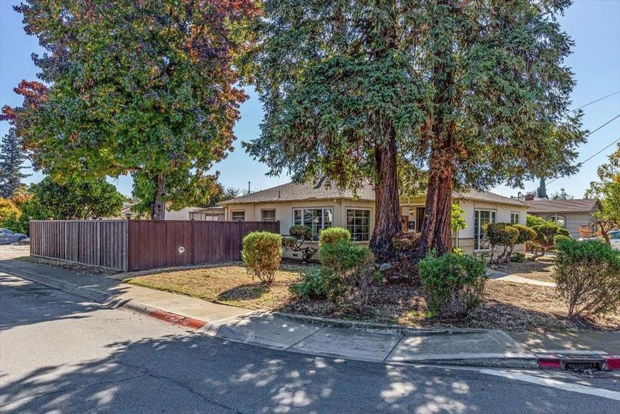 Welcome to 502 MacArthur Avenue, a classic single-story home on a corner lot in the sought-after Burbank neighborhood of San Jose. Built in 1945, this 3-bedroom, 1-bath home offers 1,257 sf of living space on a 6,510 sf lot with a detached 2-car garage and multiple bonus areas for storage and utility.  The home features all-new interior paint, new kitchen and laundry room flooring, with several dual-pane Milgard windows for natural light. The bathroom has been updated and is one of the nicest rooms in the home plus the laundry area is off the kitchen. Behind the garage is a covered patio,  and a spacious storage  area, perfect for projects or hobbies.  Additional highlights include a 200-amp electrical upgrade (per 2010 permit) and new fencing along one side of the property. Conveniently located near Valley Fair, Santana Row, and major commute routes, this home combines classic comfort with fresh updates and room to make it your own.