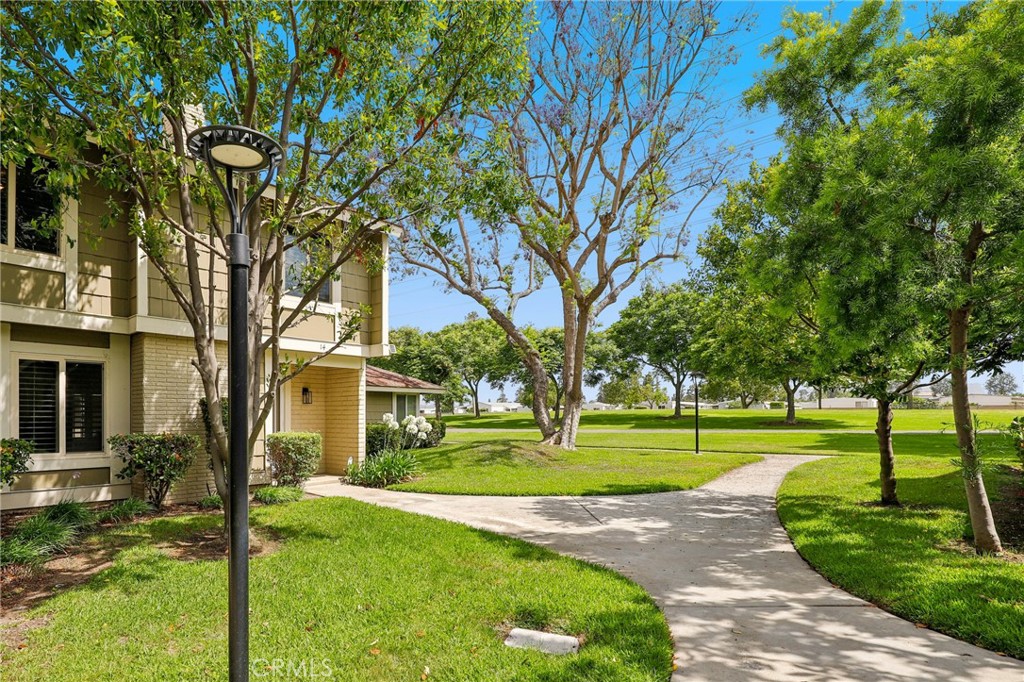 Tucked into one of Irvine’s most desirable and connected neighborhoods, this gorgeous 3-bedroom, 2.5-bathroom home in the sought-after Smoke Tree community offers the perfect blend of comfort, convenience, and California charm. Whether you're enjoying a morning coffee on the back patio or enjoying the Walnut Trail, this home places you at the center of it all—minutes from parks, top-rated schools, shopping, and resort-style amenities. From the moment you step into this beautiful home, you’re greeted by an inviting open floorplan filled with natural light and tasteful upgrades. Plantation shutters, crown molding, tile flooring, and Milgard windows complement the space, while a dramatic stacked stone fireplace and recessed lighting add warmth and character. The living area flows effortlessly into the updated dining room and gourmet kitchen, where newer white and blue shaker cabinets with soft-close hardware, quartz countertops, stainless steel appliances, and a stylish tile backsplash create a functional and beautiful heart of the home. Upstairs, the expansive primary retreat features built-in linen storage and a large walk-in closet, offering a peaceful space to unwind. Two other sizable secondary bedrooms with an updated hallway bathroom provides plenty of living options. Ceiling fans in all bedrooms add year-round comfort, and a whole-house water softener and newer HVAC system provide modern efficiency. French doors with light-filled side panels open to a spacious backyard—perfect for entertaining and relaxing. This home also offers a two-car garage and sits within close proximity to award-winning schools, Oak Creek Golf Club, Irvine Valley College, the Irvine Spectrum, and easy access to the I-5 and I-405 freeways. Community amenities are just steps away and include a pool and spa, tennis courts, a clubhouse, Hoeptner Park, Walnut Trail, and the Early Childhood Learning Center. Whether you’re upsizing, rightsizing, or simply looking for the ideal Irvine address, this move-in ready home delivers the lifestyle you’ve been waiting for.