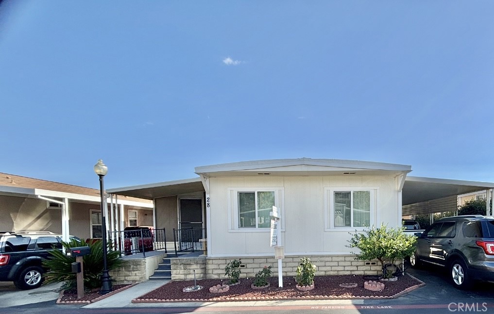 Welcome home! 8389 Baker Avenue space 28, located in the peaceful Sycamore Villa Mobile Home Community in Rancho Cucamonga. This Spacious and well-kept three-bedroom, Two-bathroom home, indoor laundry area for added convenience, central heating, covered carport, and private patio area, fruit mature trees, guava, peach, and more. The kitchen is very new and modern, with a special touch that makes this home truly beautiful. The property has improvements on ceiling and several areas in the house; you have to see it to believe it! Quiet and great community atmosphere, well maintained grounds. Enjoy a sparkling community pool, relaxing spa, playground, indoor gym, and basketball court—perfect for staying active or spending quality time outdoors. Don’t miss this opportunity to enjoy comfort, close to shopping centers, restaurants, schools, and major freeways. Just minutes from Victoria Gardens and Ontario Mills. Whether you're, buying your first home, or looking for a more affordable housing option in a great location, this home is a must-see!