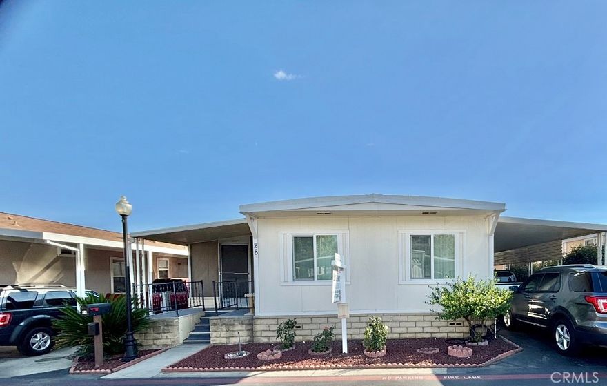 Welcome home!  8389 Baker Avenue space 28, located in the peaceful Sycamore Villa Mobile Home Community in Rancho Cucamonga. This Spacious and well-kept three-bedroom, Two-bathroom home, indoor laundry area for added convenience, central heating, covered carport, and private patio area, fruit mature trees, guava, peach, and more. The kitchen is very new and modern, with a special touch that makes this home truly beautiful. The property has improvements on ceiling and several areas in the house; you have to see it to believe it! Quiet and great community atmosphere, well maintained grounds. Enjoy a sparkling community pool, relaxing spa, playground, indoor gym, and basketball court—perfect for staying active or spending quality time outdoors. Don’t miss this opportunity to enjoy comfort, close to shopping centers, restaurants, schools, and major freeways. Just minutes from Victoria Gardens and Ontario Mills. Whether you're, buying your first home, or looking for a more affordable housing option in a great location, this home is a must-see!