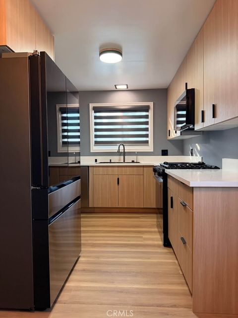 Photo of 21317 Costanso Street, Woodland Hills, CA 91364 (MLS # BB26012340)