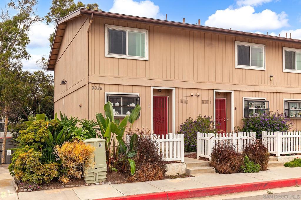 Charming, end unit Townhome in Prime Point Loma Location! This updated residence offers an unbeatable blend of location, value, and convenience, just steps from all the shops, dining, and energy of Voltaire Street and the heart of Point Loma Heights. Inside, you’ll find two generously sized bedrooms and 2.5 bathrooms, with a convenient guest half bath on the main floor and two full bathrooms upstairs. The bright, separate kitchen features classic white appliances and lovely countertops, offering a clean and functional space for everyday cooking. Enjoy peace and quiet thanks to Quieter Homes triple-pane windows! Located in Pacific Village, a quiet, well-kept community of just 22 homes, you'll appreciate the low-maintenance lifestyle and modest HOA dues. The home also includes a private attached tandem garage (fits one car with additional space for storage or a small vehicle), in-unit laundry, and a third reserved parking spot in the secure shared garage. A spacious, enclosed private patio with extra storage rounds out the features of this fantastic property! Don’t miss this opportunity, schedule your showing today!