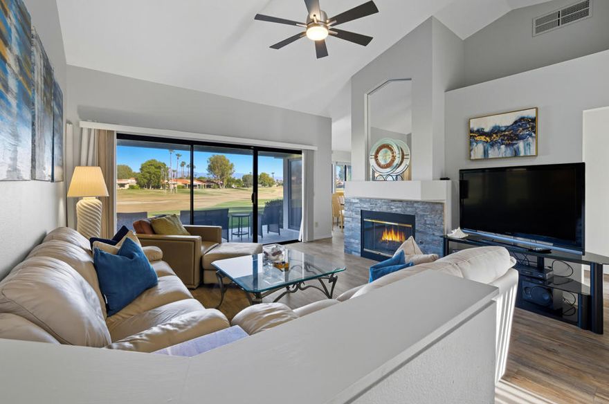 This popular Classic floorplan is nicely updated with 2 bed, 2 bath,1245 sq. ft. and is move-in ready. Located on the 2nd hole of the Palm Desert Resort Country Club. Whether you're looking for a full-time home, seasonal retreat, or investment property, this one checks all the boxes! Step inside to a bright and open floor plan with easy-care vinyl plank flooring throughout and a tile-lined fireplace in the spacious living area. A large sliding glass door leads out to the rear patio, offering gorgeous panoramic golf course views and plenty of space to relax, dine, or entertain outdoors. The kitchen has been tastefully updated with modern countertops, a deep stainless steel sink, and fresh cabinetry. There's also a dining area just off the kitchen, giving you lots of room for entertaining and meals with family and friends. The primary suite is a true highlight, featuring double-door entry for added privacy, a private slider to the backyard, a large soaking tub, dual sinks, and a generously sized walk-in closet. The guest bedroom is perfect for visitors and connects to a Jack-and-Jill bathroom, offering both privacy and convenience. You'll also appreciate the indoor laundry area. This home is part of the Palm Desert Resort Country Club, a welcoming community with access to golf, tennis, pools, spas, and a clubhouse -- all in a beautifully maintained setting. The location is ideal too, just minutes from shopping, dining, entertainment, and world-class events like the BNP Paribas Open and Coachella. If you're dreaming of desert sunsets, peaceful mornings on the patio, and a low-maintenance home in a vibrant community -- this is it. Come take a look and see why this condo is the perfect fit for your next chapter.