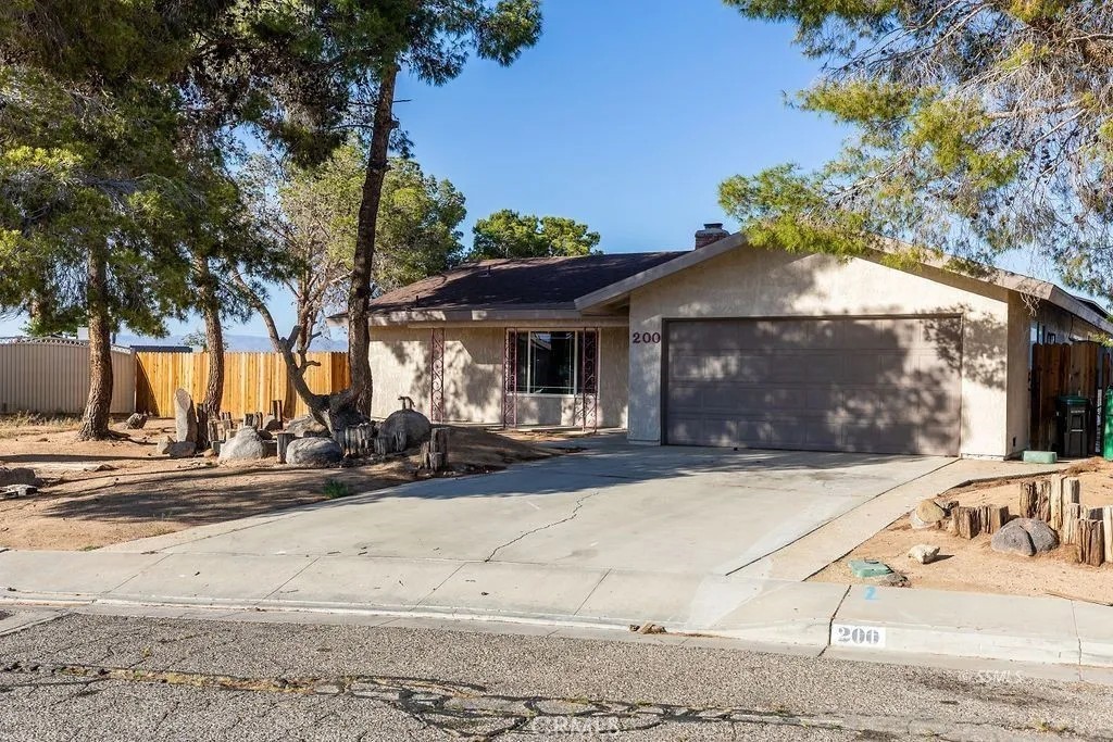 Discover the charm and value of 200 W Mariposa Ave — a well-maintained 4-bedroom, 2-bathroom single-story home located in an established Ridgecrest neighborhood. This property offers a functional and flexible layout designed to suit a variety of living needs.
The interior features a bright and open living area with natural light and a seamless flow into the kitchen and dining spaces. The kitchen provides generous cabinet and counter space, suitable for both daily routines and entertaining. The primary bedroom includes a private en-suite bathroom, and three additional bedrooms offer space for multiple uses such as guest accommodations, workspace, or creative activities.
Outdoors, enjoy a fully fenced backyard with a refreshing in-ground pool, ideal for leisure and gatherings. The lot also offers ample RV parking and potential to build an Accessory Dwelling Unit (ADU)—a valuable option for future expansion or additional income (buyer to verify local regulations and permits).
Additional features include central heating and air conditioning, an attached garage, and a large driveway. Conveniently located near retail, dining, schools, and NAWS China Lake, this property provides both comfort and practical amenities.
Schedule your private tour and explore everything this Ridgecrest home has to offer.
Don’t miss out on this unique opportunity—schedule your private showing today!