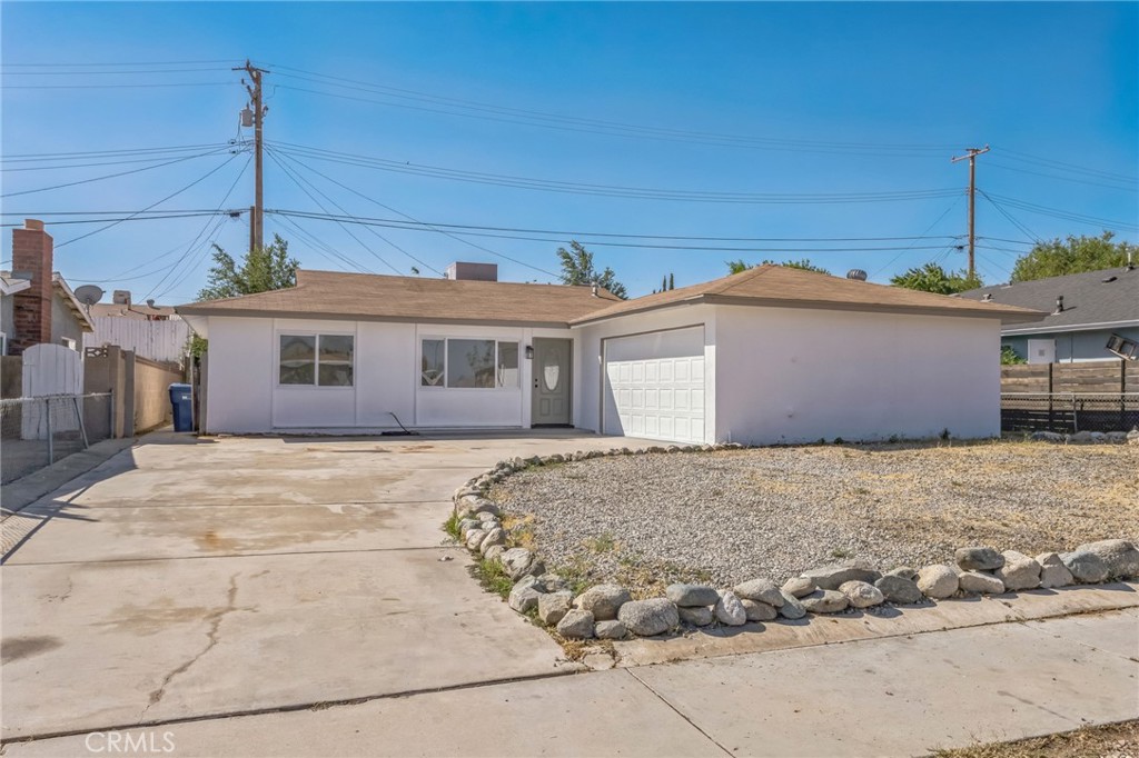 This beautifully updated, move-in ready home offers 3 spacious bedrooms and 2 full bathrooms perfect for families, first time buyers, or anyone looking for comfort and convenience. Located in a peaceful neighborhood, the property features a generous yard ideal for summer BBQs, gardening, or relaxing outdoors. Don’t miss this turnkey gem!