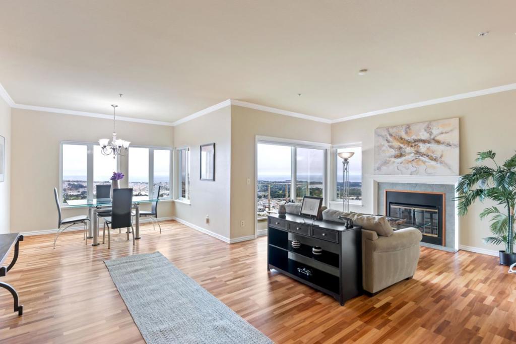 Welcome to this beautifully updated 3 bedroom, 2.5 bathroom condo with sweeping panoramic views of the Pacific Ocean! Located in the serene, gated community of Pointe Pacific, this two-story home offers a perfect blend of comfort and convenience. The upper level welcomes you with a spacious living room that opens to a private balcony that takes in the stunning ocean views. A dedicated dining area flows into the remodeled kitchen featuring sleek finishes and cherry wood cabinets. A half bathroom completes the upper level. Downstairs, the large primary suite includes a luxurious jacuzzi tub, walk-in stall shower, Jack and Jill double vanity, and generous walk-in closet. Two additional bedrooms, a full hallway bathroom, and a separate laundry room provide comfort and functionality. Enjoy a peaceful hillside setting while being just minutes from shopping, dining, Trader Joes, Cinemark Century Theatres, and major commuter routes including Highways 101 and 280with BART access close by for added convenience.