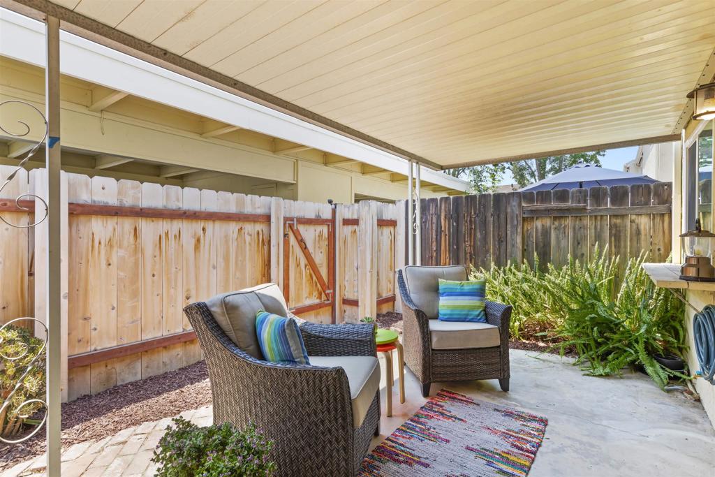 Seller is entertaining offers between $550,000 and $579,000. Step inside to find a bright and open floor plan featuring a living room, a cozy dining area, and an efficiently designed kitchen with ample cabinet and counter space. The three generously sized bedrooms provide flexibility for a growing household, guest room, or home office. This home is perfectly suited for first-time buyers, those relocating to the area, or savvy investors; this home combines functionality with modern touches. Other features include in-unit laundry, plenty of closet storage, and two designated parking in the carport. Enjoy low maintenance living with a community that includes water and trash included. Conveniently located close to the community pools, shopping, parks, dining, schools, and major commuter routes to take you to Military Bases, the Beach, Hiking Trails and Downtown. This condo offers the perfect blend of convenience and comfort.