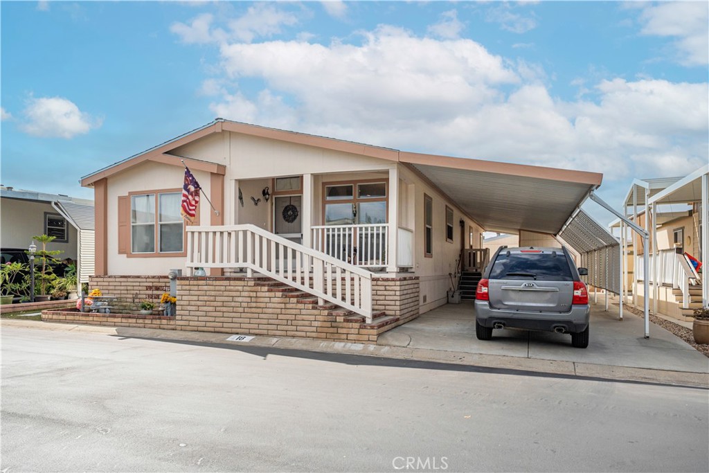 This beautiful and spacious 2 bedroom/2 bath home is located in the highly sought after ALL AGE community of Cienega Valley Estates. This home offers high coffered ceilings, a large kitchen with plenty of room for a dinette set, formal dining area, spacious living room, and a large laundry room. The primary bedroom is large enough to accommodate a king bed and it also has a large walk-in closet. The other bedroom is of ample size with enough room for a queen bed. The office space can easily be transformed to meet your needs, whether you need a dedicated home office, or a cozy guest room. It also has a large front porch that you can easily put a couple of chairs and a small table to sit and enjoy the afternoon or evening breeze. The carport has room for three cars depending on their size and there is a large storage shed. The community's amenities include a pool, large pool area with outdoor furniture for you to enjoy the sunshine and relax. There is also an indoor jacuzzi, saunas in both restrooms, basketball court, gym, game room, library and a large kitchen in the clubhouse for the residents to enjoy. Additionally, the community also has a carwash area, hair salon, RV parking, a putting green and a small park area with a gazebo. The community is conveniently located close to shopping, schools and freeways. This home is a must see! Don't miss out on the chance to live in this beautiful and friendly community. All potential buyers must meet the qualifications and be approved by the Management/Corporate office to reside in the community.