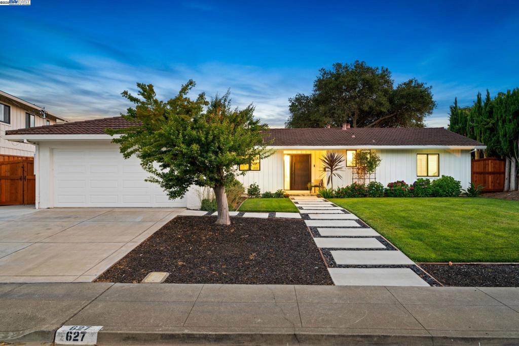 AMAZING PANORAMIC VIEWS! NEWLY REMODELED. Move-in Ready. Must see property Walking Distance to Downtown Pleasanton! Modern elegance meets prime location in this beautifully updated home in Pleasanton Heights. Located near top rated schools and downtown Pleasanton, perfect for enjoying concerts in the park, the farmers market, amazing restaurants and shops. Features include a freshly remodeled chef inspired kitchen, formal dining room, cozy living area with 2-sided fireplace, and a beautifully landscaped backyard with a wood deck, garden, and stunning Pleasanton Ridge views. The property also offers a convenient side yard with potential for RV parking. The primary suite features a dual vanity sink and tiled stall shower. Additional upgrades include beautifully updated wood plank flooring, recessed lighting, epoxy garage flooring, and more. This move in ready home blends comfort, style, and convenience.