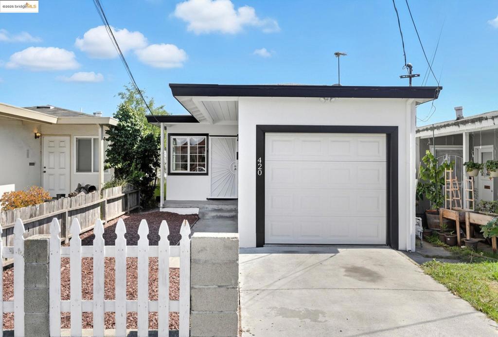 Why settle for a condo when you can enjoy the comfort, privacy, and independence of a full single-family home? Discover 420 S 38th Street, a beautifully updated mid-century bungalow in Richmond’s North & East neighborhood, right on the El Cerrito border. This light-filled 3BD/1BA home features an airy open layout with recessed lighting, a neutral palette, and seamless flow between living spaces. The renovated kitchen boasts white cabinetry, designer tile backsplash, sleek countertops, and stainless steel appliances, while the updated bathroom offers contemporary finishes. Low-maintenance yards provide space to relax or entertain. Conveniently located near Shields-Reid Park, Point Isabel, El Cerrito Plaza, and Berkeley’s 4th Street District, with easy access to I-80/580 and just 7 minutes to El Cerrito del Norte BART, this move-in ready home combines comfort, style, and commuter convenience. Qualified buyers may be eligible for a special financing program offering a low 3% down payment, reduced interest rate, and waiver of mortgage insurance with no first-time buyer requirement.