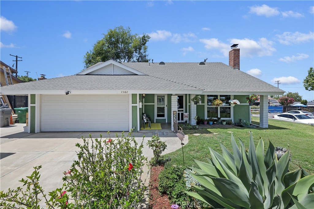 Entering this beautiful home on a corner lot in South Corona, you will find it was recently renovated. As you enter the front doors, you will find new paint and "wood looking" tile flooring with new carpet & baseboards throughout. There is a fireplace in the Living room and large dining area for family get-togethers! Enjoy the newly remodeled Kitchen with new sink, granite counters, fixtures, stove top and oven! A breakfast bar separates the Kitchen from the Formal Dining area... Additional dining area in the Kitchen. The Master Suite on the first floor is off by itself which includes a newly renovated bathroom with a walk in shower. There is a 2nd Master Bedroom with bathroom direct access upstairs. All bedrooms are large and will accommodate King Beds or two sets of Bunk Beds!! There is "walk in access" to the "stand up, well insulated attic which also houses a Whole House Fan! The Sliding Glass Door leads to Covered Patio and an OVERSIZED back yard with endless opportunities for a pool or RV access. Access to the 2 car garage from the house...Extra wide driveway provides parking for 3 cars if needed. Freeway close to the 91 or 15 - Walking distance to local schools. This home is "move in ready" and will sell quickly, come take a look!!