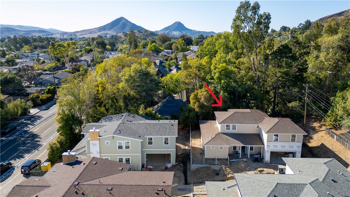 Only 2 homes left! Welcome to this exceptional new construction home by renowned builder Greg Nester, set for completion in December 2025. Offering 2,942 sq. ft. of thoughtfully designed living space, this property includes a 3-bedroom, 3.5-bath main residence plus a 1-bedroom, 1-bath ADU, blending modern elegance with functional versatility. The open-concept layout features a gourmet kitchen with premium appliances, custom cabinetry, quartzite countertops, and a large center island, seamlessly connecting to the dining and living areas—perfect for entertaining. The luxurious primary suite provides a serene retreat with a spa-inspired bath, dual vanities, and a spacious walk-in closet, while two additional bedrooms each feature en-suite baths for ultimate comfort. A stylish powder room offers added convenience for guests. The attached ADU, with its own private entrance, kitchen, living area, bedroom, and bath, provides incredible flexibility—ideal for rental income, a guest suite, or multigenerational living. Designed with energy efficiency and high-end finishes throughout, this home also offers a covered outdoor living space to enjoy year-round. Situated in a desirable neighborhood near shopping, dining, and top-rated schools, this is a rare opportunity to own a truly exceptional property.