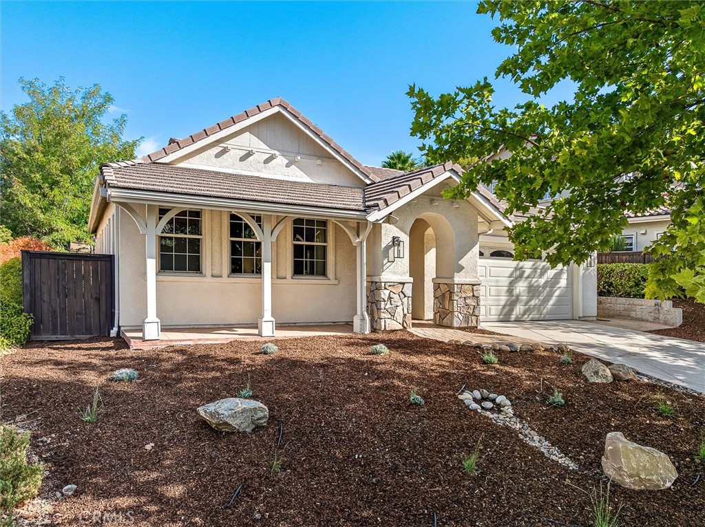 Welcome to your well-maintained Westside Templeton home in Peterson Ranch. Step inside and experience the elevated warmth of real oak hardwood floors and a spacious open floor plan framed by cathedral ceilings, perfectly blending comfort and style.
The inviting layout features a sun light-filled kitchen and dining area at one end, which opens to a living room with a warm, low-maintenance gas fireplace. 730 Rosebay Way is ideal for both everyday living and entertaining. With a split-wing design, the large primary bedroom becomes its own retreat. The primary bathroom includes stone counters, stone flooring, and a custom walk-in tile shower.
On the other side of the home, a hallway provides privacy to the two additional bedrooms and the guest bathroom. Large windows in the living area offer views of the expansive backyard and sloped hill adorned with beautiful trees.
The Peterson Ranch Garden neighborhood’s charm shines with tree-lined streets, sidewalks, and access to award-winning Templeton schools. Imagine celebrating the holidays here and making lasting memories in your new home!