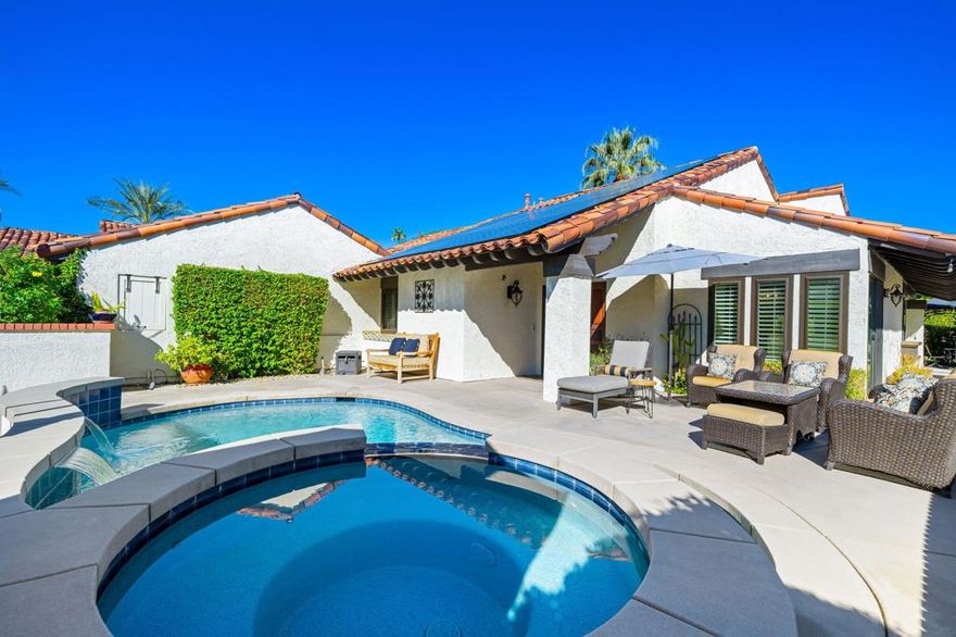 Freshly Updated and Move-In Ready!Completely repainted inside, this beautifully refreshed Mediterranean-style home in sought-after Casas De Sevilla offers the perfect blend of style, comfort, and energy efficiency. Situated on a quiet cul-de-sac with majestic mountain views, the home features three ensuite bedrooms, a chef-inspired kitchen, and bright, open living spaces designed for easy desert living.Enjoy year-round comfort with owned solar and dual-pane windows that enhance efficiency and peace of mind. Step through elegant glass doors into a spacious living area with a sunken living room, fireplace, and French doors leading to a private backyard retreat. The primary suite includes direct patio access, a large walk-in closet, dual vanities, and a sunken tub for relaxing after a long day.Outdoors, the sparkling pool and spa, built-in BBQ, and covered cabana create a resort-style setting perfect for entertaining. Casas De Sevilla features four pools, two tennis courts, and lush greenbelts, all just minutes from shopping, dining, and golf.A beautifully updated, energy-efficient home offering true desert living at its finest!