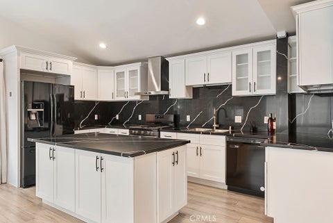 Photo of 18646 Ingomar ST, Reseda, CA 91335 (MLS # OC26142732)