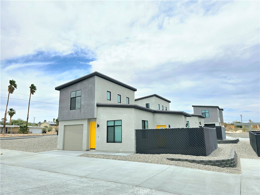 BRAND NEW 1 BED 1 BATH CONDO
**Discover Your Dream 1 Bed, 1 Bath Luxury Condo in 29 Palms!**
Introducing our brand new, beautifully constructed 1-bedroom, 1-bath luxury condo units, conveniently located in the heart of 29 Palms. These modern, two-story condos are designed for the discerning renter looking for stylish and comfortable living.
**Key Features:**
- **Private Outdoor Space:** Enjoy your own fenced backyard, perfect for relaxing or entertaining.
- **Dual Heating & Cooling Zones:** Experience year-round comfort with efficient climate control tailored to your preferences.
- **High-End Appliances:** Each unit comes equipped with stainless steel appliances, including a washer and dryer for ultimate convenience.
- **Elegant Interiors:** Solid quartz countertops and luxury vinyl plank (LVP) flooring flow throughout, blending style with functionality.
- **Secure Parking:** A single-car garage provides not only protected parking but additional storage opportunities. Each unit will also offer a 1-Car covered parking spot.
- **EV Ready:** Each unit includes a 50 Amp EV car charger, making it easy to charge your electric vehicle right at home.
Don't miss out on this exceptional opportunity to elevate your living experience in a prime location. Contact us today to schedule a tour of these fantastic luxury condos and see for yourself what makes them truly special!