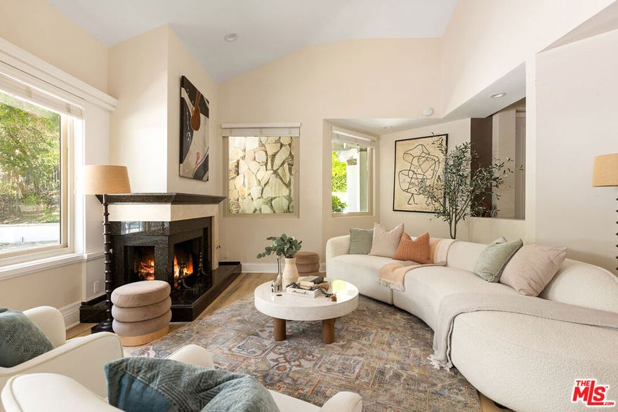Nestled in the prestigious North Ranch community of Westlake Village, this single-story residence offers over 4,300 sq ft of living space on a half-acre lot. With 4 bedrooms and 4 bathrooms, the home combines spacious interiors with a private outdoor retreat. The entryway with soaring ceilings and stone tile flooring opens to a bright formal living room with fireplace and walls of windows. A large dining room provides the perfect setting for gatherings, while the great room features another fireplace and space for entertaining. The kitchen is equipped with Sub-Zero, Wolf, and Bosch appliances, complemented by a large pantry and abundant cabinetry. The oversized primary suite includes high ceilings, a fireplace, direct access to the backyard, and a spa-style bathroom. Three additional bedrooms and bathrooms offer comfort and flexibility for family, guests, or office space. Outside, the backyard is designed for leisure and entertaining, complete with a heated pool, spa, built-in BBQ, and mature landscaping for privacy. Additional highlights include:Three-car garage with storage and EV chargers, solar panels for energy efficiency(buyer to assume solar payments), security system and electric gate, Samsung washer & dryer, and Smart toilets. Just minutes from The Promenade at Westlake, The Shoppes at Westlake Village, and fine dining options including Tuscany Il Ristorante, Stonehaus, and Mediterraneo. Outdoor enthusiasts will appreciate the nearby North Ranch Country Club, Westlake Lake, and miles of hiking and biking trails.