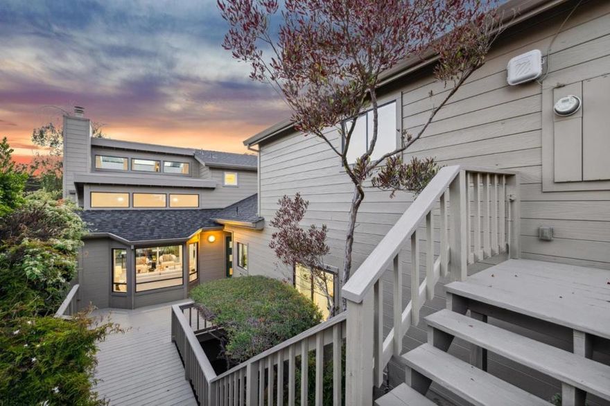 Nestled in the charming coastal community of El Granada, this spacious 5-bedroom, 3-bathroom home offers an inviting and functional layout. The well-equipped kitchen features a gas oven range, microwave, dishwasher, and refrigerator, perfect for culinary enthusiasts. High ceilings, skylights, and vaulted ceilings enhance the airy feel throughout the 2,770 square foot property.  The home boasts beautiful flooring, a cozy fireplace, and a separate family room for relaxation and entertainment. Laundry facilities are conveniently located inside the home, in the utility room, complete with a washer and dryer. The Cabrillo Unified School District serves the property's location, providing educational services for the area.  With thoughtful amenities and design elements, this El Granada gem is ideal for families and those seeking comfort and convenience. A 2-car garage provides ample space for vehicles and storage, and a minimum lot size of 5,278 square feet offers outdoor possibilities.