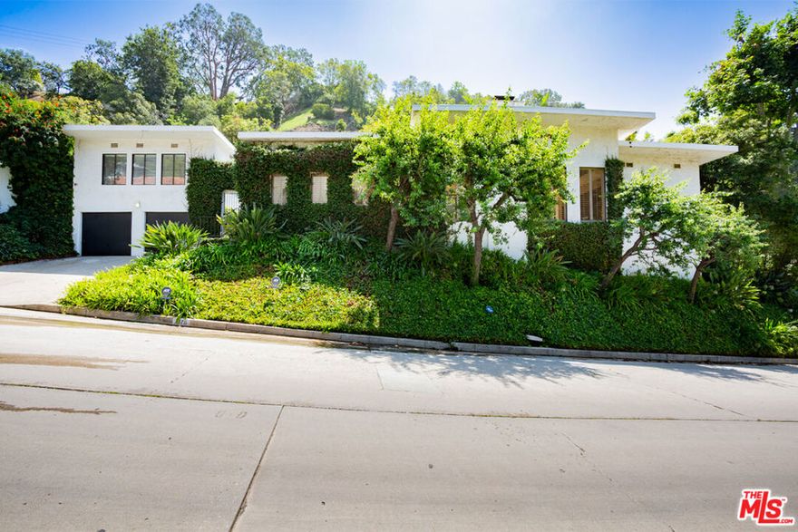 A Unique Opportunity Awaits at 1370 Schuyler Road. Nestled within the prestigious Beverly Hills Post Office, this 1948 mid-century modern residence beckons both end-users and developers to unleash its full potential. This is your chance to restore, remodel, or reimagine this timeless property.Located on the widest part of lower Schuyler Road, this property is just a stone's throw away from one of Los Angeles' most valuable mega estates, "The Knoll." The location offers not only an exceptional address but also proximity to the city's most exclusive amenities and attractions.The main house features 2 bedrooms and 2 bathrooms, embodying the quintessential mid-century modern charm. Its open living spaces, large windows, and clean lines provide a canvas for your vision and creativity.A detached guest house awaits with 1 bedroom, 1 bathroom, and a kitchenette. Ideal for accommodating guests, extended family, or transforming into a private office space.Step outside to discover a tranquil pool area surrounded by mature landscaping, offering a private oasis to relax and unwind. The street-to-street lot provides ample possibilities for outdoor living and entertaining.