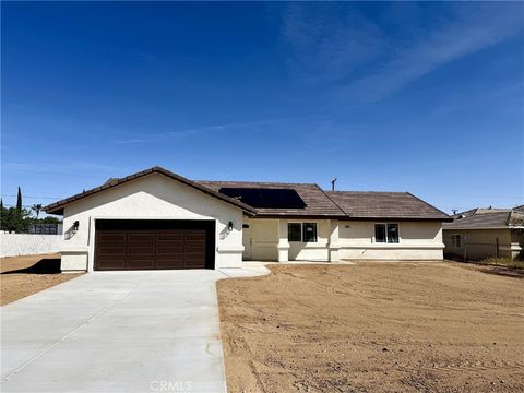 Photo of 15056 Coalinga Rd, Victorville, CA 92392 (MLS # HD26071754)